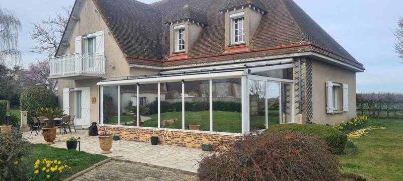 Maison avec verrière protégée par des films solaires près de Paris