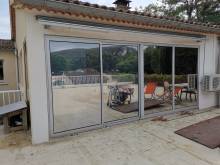 Fenêtres et vitrages des espaces de rangements et réserves  après pose de films solaires anti-chaleur  en Ardèche (07)
