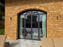 Films de protection solaire Clarity 333 XC pour baies vitrées dans le Rhône